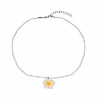 WHITE SEED BEAD & FRANJIPANI CHOKER