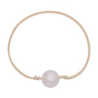 CIRCULAR ROSE QUARTZ ANKLET ON NATURAL CORD