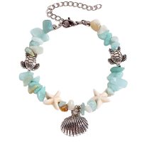 TURTLE & CLAM BRACELET W/ DYED BLUE CHIPS