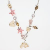 P8304 ROSE QUARTZ CHIP NECKLACE W/ MARINE CHARMS