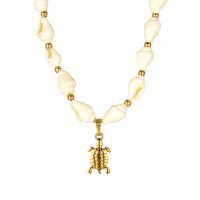 P8530 SEASHELL CHOKER W/ GOLD TURTLE