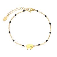 BR8558 BLK BEAD & STAINLESS STEEL GOLD CHAIN ELEPHANT BRACELET